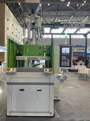 Macchine di stampaggio a iniezione verticale rotante per la produzione di precisione